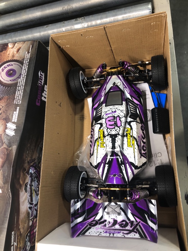 Photo 2 of GoolRC WLtoys 124019 RC Car, 1/12 Scale 2.4GHz Remote Control Car, 4WD 60km/h High Speed Racing Car, Off-Road Buggy Drift Car RTR with Aluminum Alloy Chassis, Zinc Alloy Gear and 1 Battery
