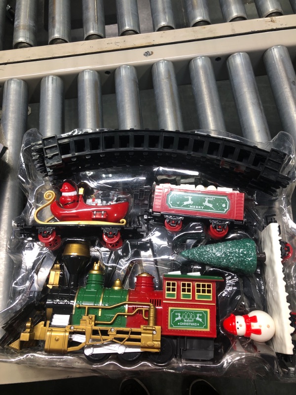 Photo 2 of Christmas Train Set Toys Around Christmas Tree, Electric Railway Train Set w/ Lights & Sound, Railway Kits w/ Locomotive Engine, Cargo Cars & Tracks, Christmas Spirit Gift for Kids Boys Girls