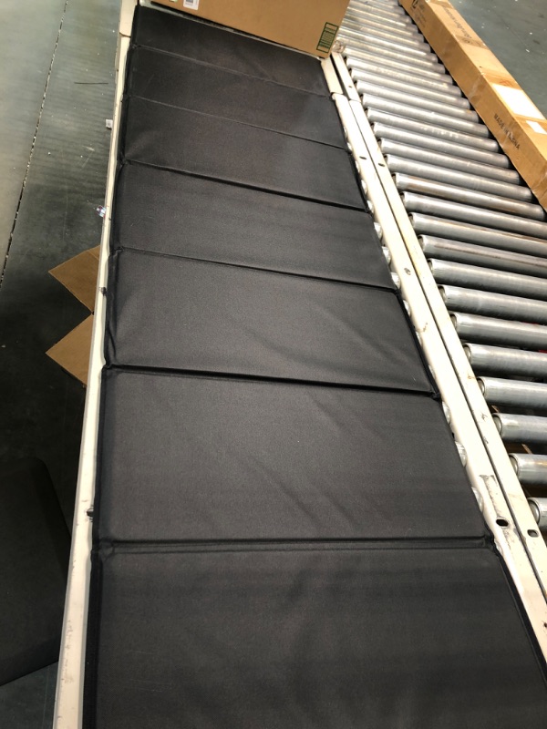 Photo 1 of Black foldable hard mat 66" long 20" wide