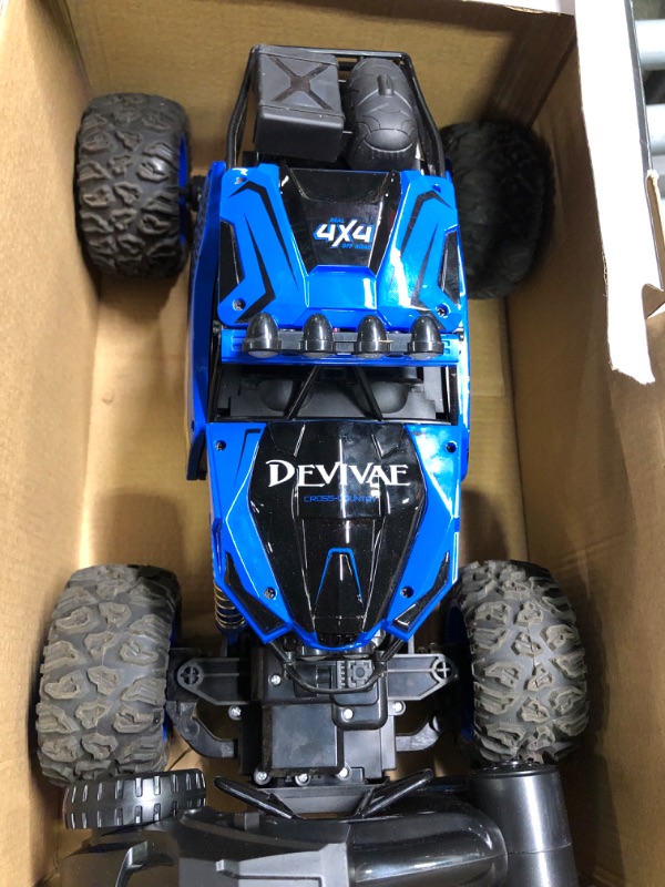 Photo 1 of CROBOLL 1:12 Large Remote Control Car for Boys Kids with Lifting Function,4WD RC Cars Electric Monster Truck Toy Gifts 4X4 Off-Road RC Rock Crawler 2.4GHz All Terrain RC Truck with 2 Batteries(Blue)