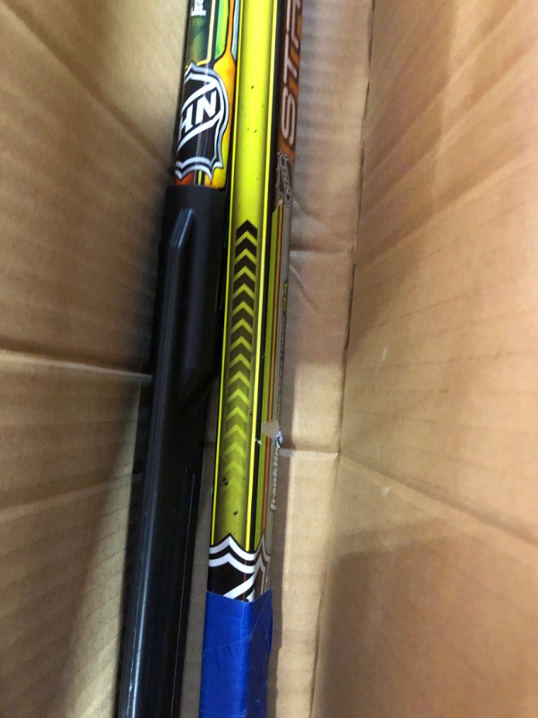 Photo 1 of Franklin Sports NHL Kids Street Hockey Stick Set - Includes (2) Youth Street Hockey Sticks + (1) Outdoor Roller Hockey Ball - Perfect Hockey Starter Set for Kids Player Sticks **ONE STICK IS BROKEN IN HALF**