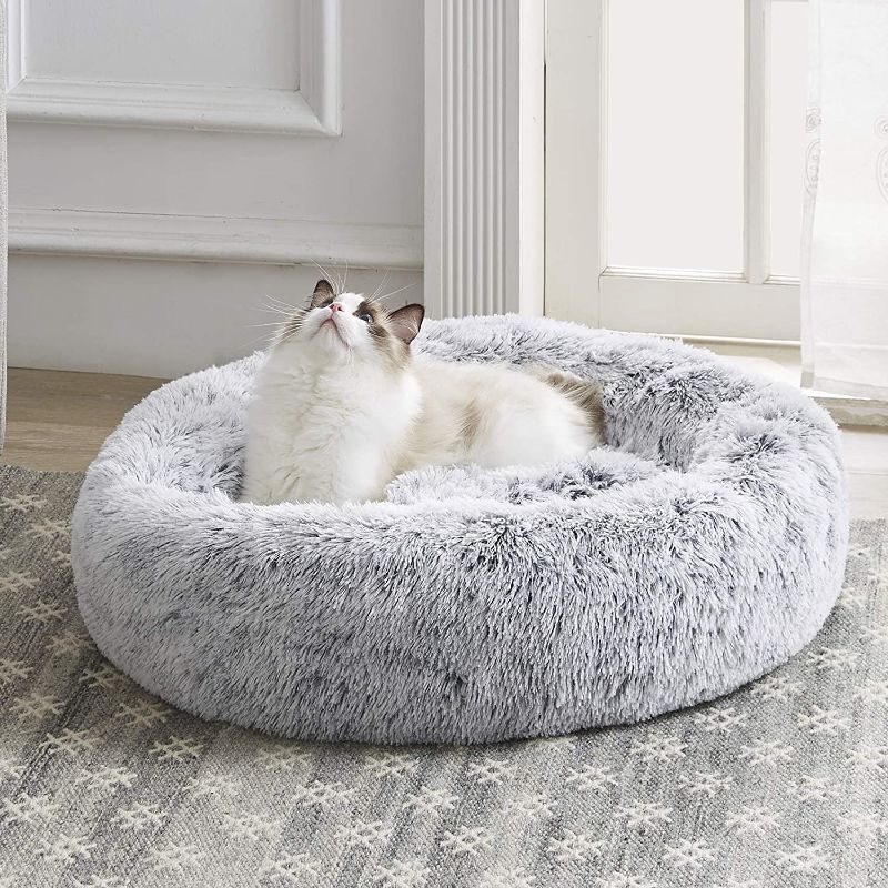 Photo 1 of Western Home Faux Fur Dog Bed & Cat Bed, Original Calming Dog Bed for Small Medium Large Pets, Anti Anxiety Donut Cuddler Round Warm Washable Cat Bed for Indoor Cats(20", Light Grey) 20 x 20 Inch Light Grey