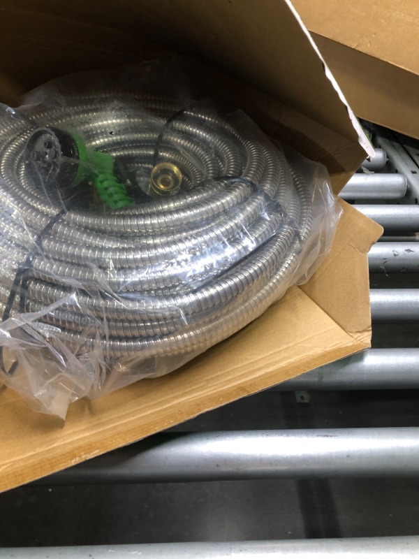 Photo 4 of Yereen 304 Stainless Steel Metal Garden Hose 100FT, Garden Hose with 3/4" Solid Brass Fittings and 2 Function Nozzle, Kink Free Flexible Outdoor Water Hose 100FT-Updated Bright Silver