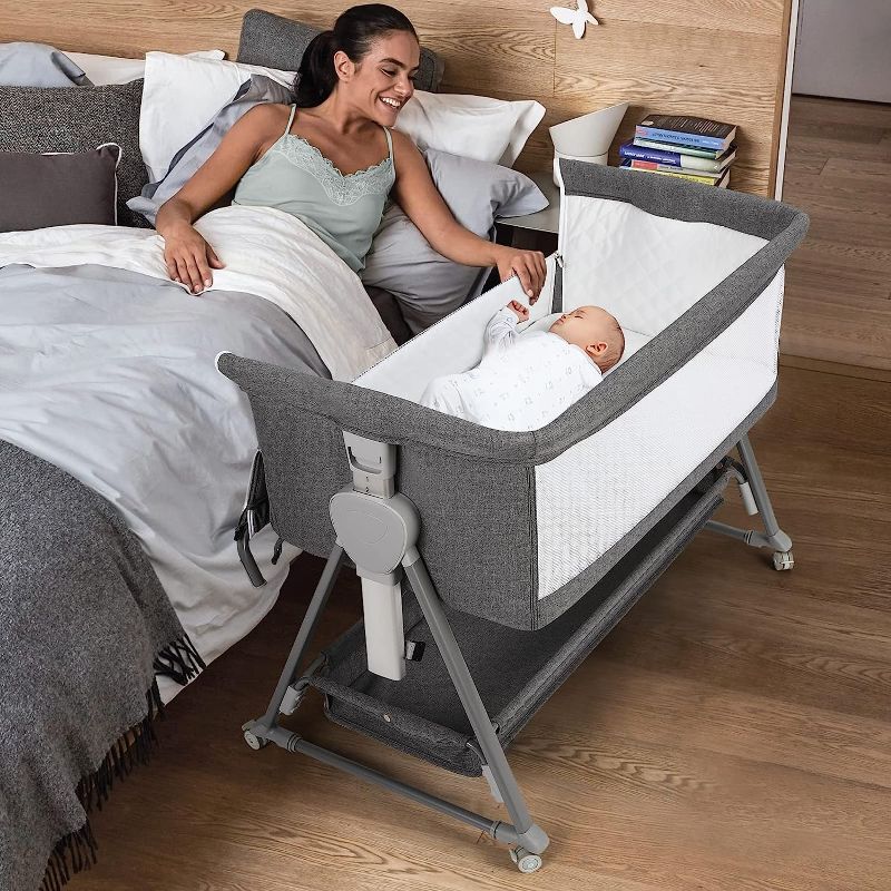 Photo 1 of Cowiewie Baby Bassinet, Beside Sleeper for Baby Easy Folding Bedside Bassinet with Storage Basket and Wheels to Reduce Mom's Fatigue (Dark Grey) 2023 New
