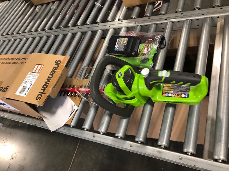Photo 3 of ****MISSING BATTERY*******  Greenworks 24V 22" Cordless Hedge Trimmer, 2.0Ah Battery and Charger Included Hedge Trimmer (2.0Ah)