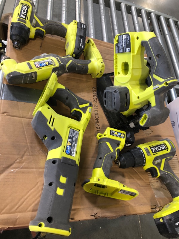 Photo 3 of RYOBI P1819 18V One+ Lithium Ion Combo Kit (6 Tools: Drill/Driver, Impact Driver, Reciprocating Saw, Circular Saw, Multi-Tool, LED Worklight, 4.0 Ah & 1.5 Ah Battery, Charger, Bag)