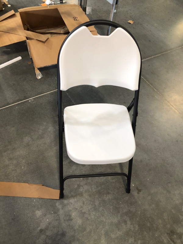 Photo 3 of Amazon Basics Folding Plastic Chair, 350-Pound Capacity, White, 4-Pack 4-Pack White Plastic Chair