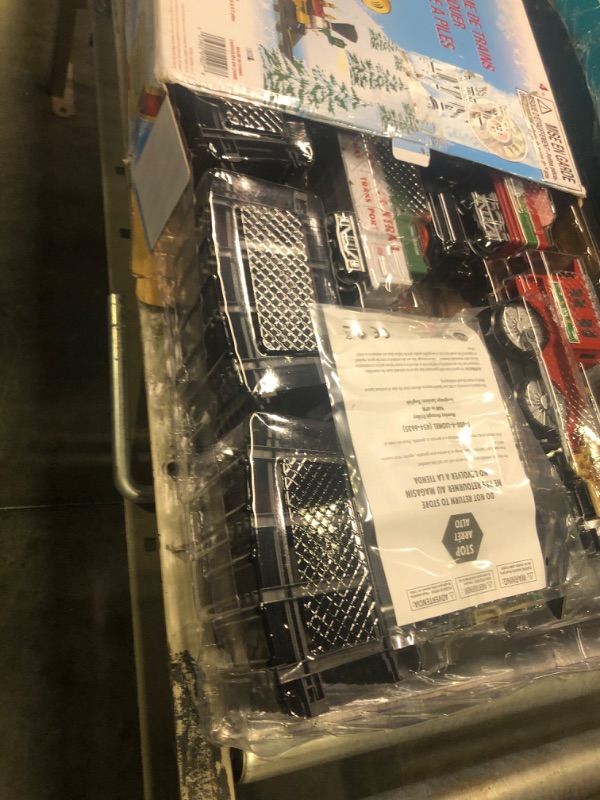 Photo 1 of Lionel North Pole Central Battery-Powered Train Set with Remote + Inner Loop Track Expansion Pack Complete Set + Expansion Track (Inner Loop)