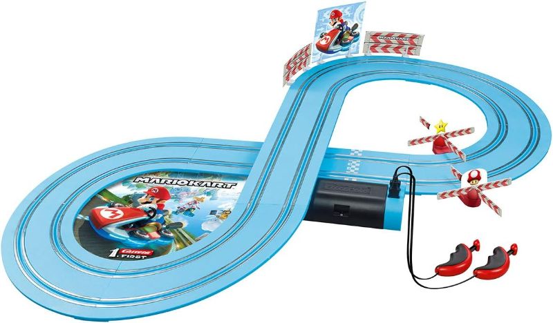 Photo 1 of Carrera First Mario Kart - Slot Car Race Track with Spinners - Includes 2 Cars: Mario and Luigi - Battery-Powered Beginner Racing Set for Kids Ages 3 Years and Up