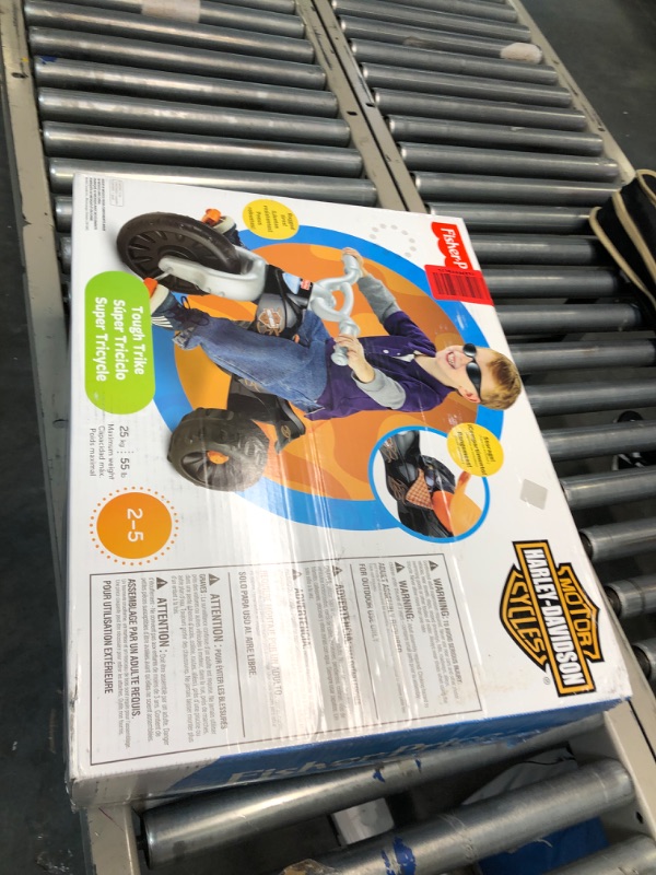 Photo 1 of Fisher-Price Harley-Davidson Tricycle with Handlebar Grips and Storage Area, Multi-Terrain Tires, Tough Trike [Amazon Exclusive]