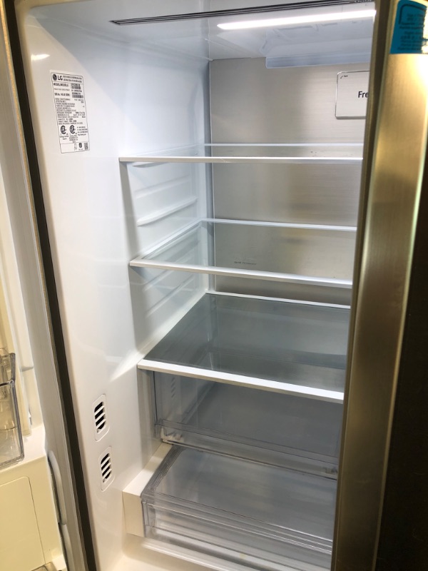 Photo 8 of LG LRFOC2606S 26 Cu. Ft. Stainless Counter Depth French Door Refrigerator **unable to test**