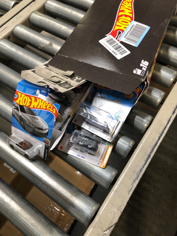 Photo 2 of Hot Wheels Basics Black Box, 16 First-Appearance Toy Cars in 1:64 Scale, Possibly Includes a Treasure Hunt Car, Toy for Collectors & Kids 3 Years Old & Older Box H