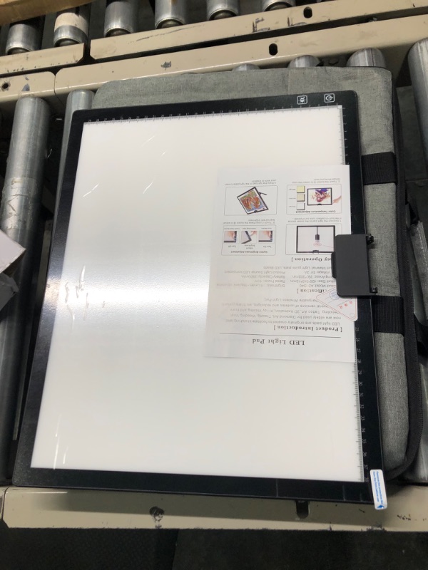 Photo 2 of A3 Led Light Pad with Carry Bag , 2500mha Battery Powered , 3 Colors Stepless Dimmable 6 Levels of Brightness Light Box Tracing Light Box for Diamond Painting, Sketching ,Built-in Stand, Magnet Clip A3-Black with Carry Bag