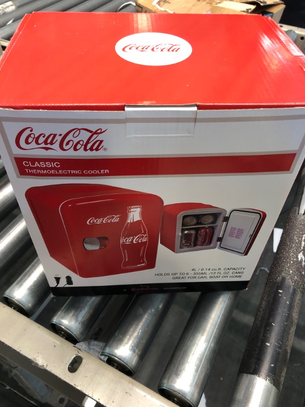 Photo 3 of Coca-Cola Classic Coke Bottle 4L Mini Fridge w/ 12V DC and 110V AC Cords, 6 Can Portable Cooler, Personal Travel Refrigerator for Snacks Lunch Drinks Cosmetics, Desk Home Office Dorm, Red