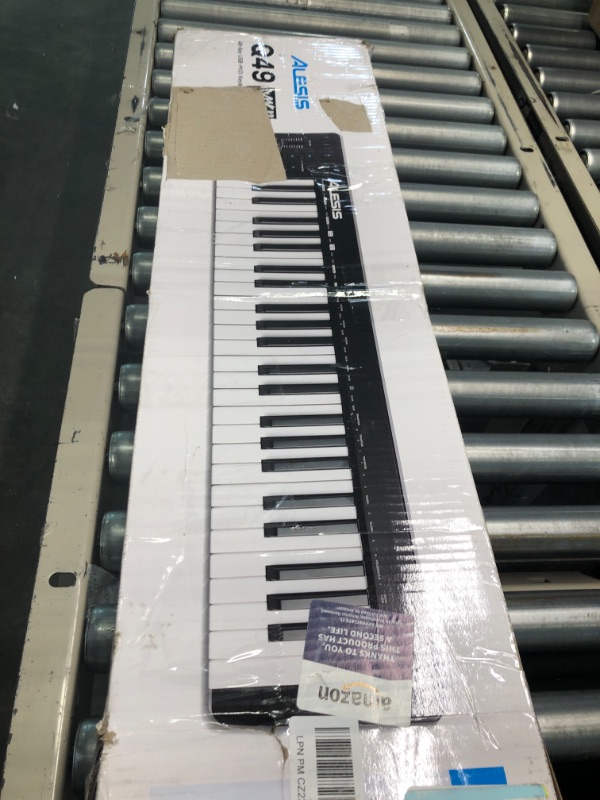 Photo 1 of Alesis Q49 MKII - 49 Key USB MIDI Keyboard Controller & M-Audio HDH40 – Over Ear Headphones with Closed Back Design, Flexible Headband and 2.7m Cable for Studio Monitoring, Black 49 keys Controller + Headphones