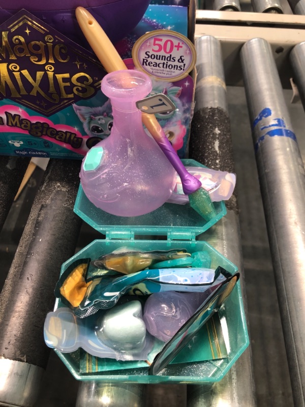 Photo 1 of Magic Mixies Magical Misting Cauldron with Interactive 8 inch Blue Plush Toy and 50+ Sounds and Reactions, Multicolor
