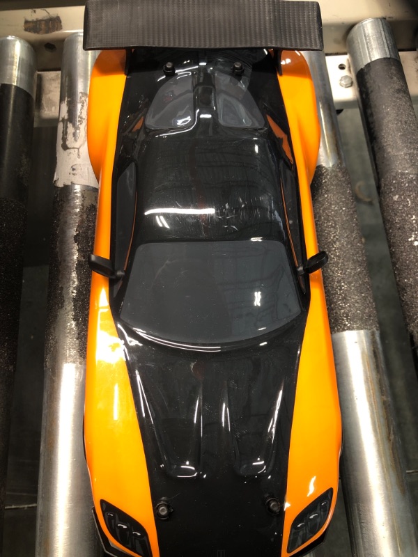 Photo 1 of Jada Toys Fast & Furious Han’s Mazda RX-7 Drift RC Car, 1: 10 Scale 2.4Ghz Remote Control Orange & Black, Ready to Run, USB Charging (Standard) (99700)