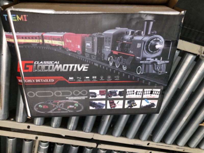 Photo 2 of Electric Classical Train Sets with Steam Locomotive Engine, Cargo Car and Tracks, Battery Operated Play Set Toy w/ Smoke, Light and Sounds, Perfect