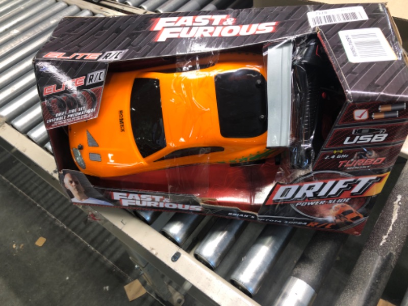 Photo 2 of Jada Toys Fast & Furious 1:10 Toyota Supra Remote Control Car Drift Slide RC with Extra Tires 2.4GHz, Toys for Kids and Adults