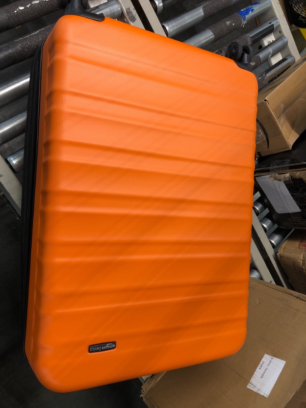 Photo 3 of Amazon Basics 30-Inch Hardside Spinner, Orange Orange 30-inch Spinner