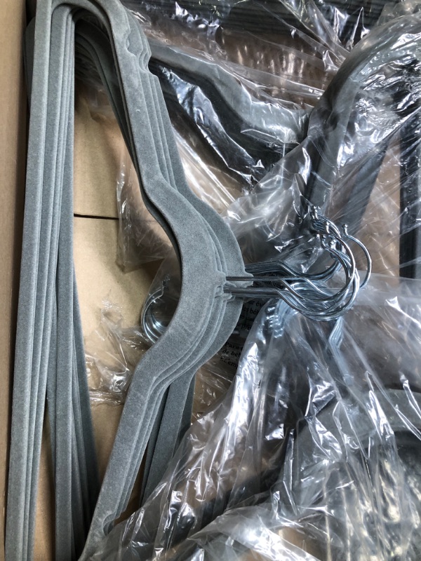 Photo 1 of Amazon Basics Slim, Velvet, Non-Slip Suit Clothes Hangers, Gray/Silver - Pack of 50 50-Pack Gray/Silver