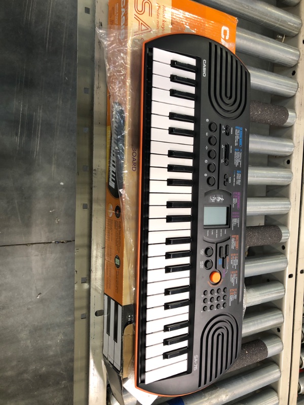 Photo 1 of Casio SA-76 44-Key Mini Personal Keyboard ORANGE SA-76 Keyboard