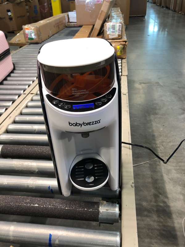Photo 1 of New and Improved Baby Brezza Formula Pro Advanced Formula Dispenser Machine - Automatically Mix a Warm Formula Bottle Instantly - Easily Make Bottle with Automatic Powder Blending