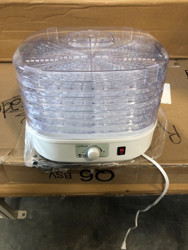 Photo 1 of NutriChef PKFD06 Kitchen Countertop Electric Food Dehydrator Preserver Machine with Adjustable Temperature and 5 Stackable Tray Racks