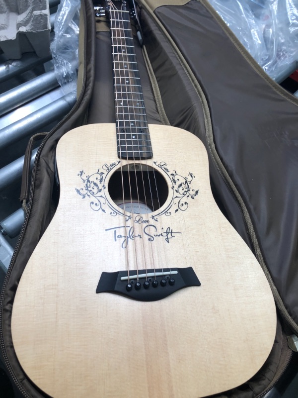 Photo 4 of Taylor Swift Signature Baby Taylor Acoustic-Electric Guitar Natural

**FACTORY PACKAGED--OPENED IN WAREHOUSE FOR PICTURES ONLY**