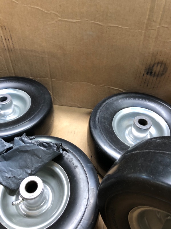 Photo 1 of AR-PRO (4-Pack) 9x3.50-4” Flat Free Lawnmower Tire with 4" Centered Hub, 3/4" Bushings and Wheel Assemblies - PU Tire on Wheel and Adapter Kits