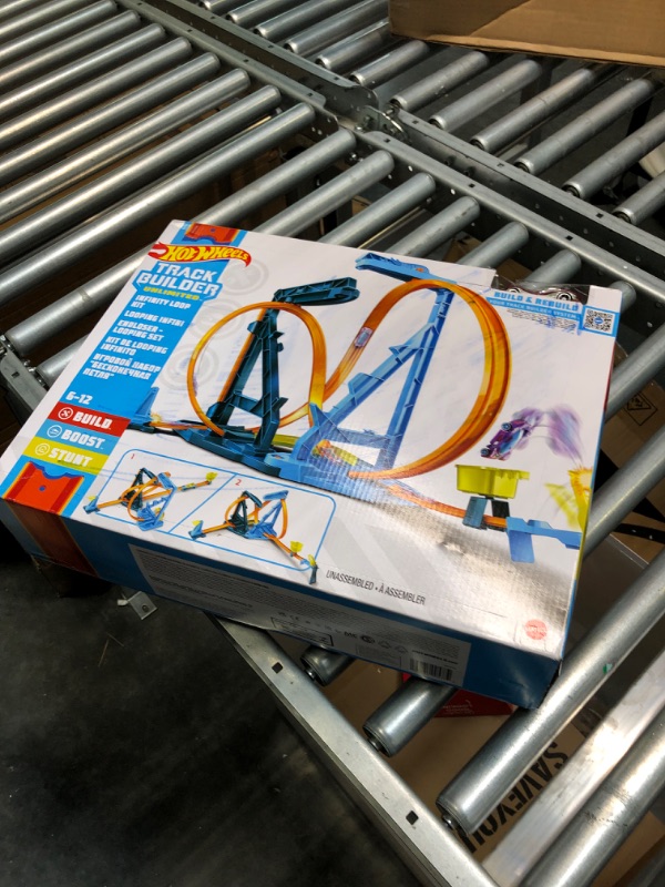 Photo 5 of Hot Wheels Track Set and 1:64 Scale Toy Car, Track and Loop Building Kit with Adjustable Set-Ups and Jump, Infinity Loop Kit??? SIOC/FFP