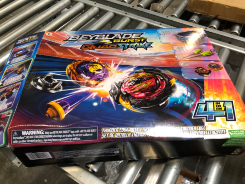 Photo 2 of Beyblade Burst QuadStrike Thunder Edge Battle Set, Battle Game Set with Beystadium, 2 Spinning Top Toys, and 2 Launchers for Ages 8 and Up