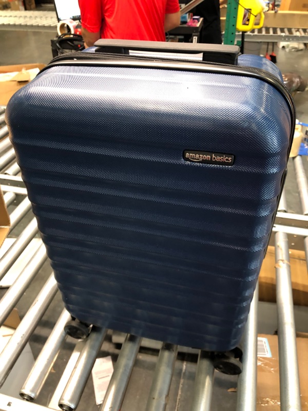 Photo 1 of Amazon Basics 21-Inch Hardside Spinner, Navy Blue Navy Blue 21-inch Spinner