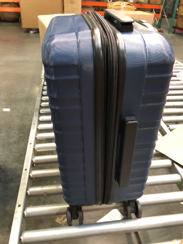 Photo 1 of Amazon Basics 21-Inch Hardside Spinner, Navy Blue Navy Blue 21-inch Spinner