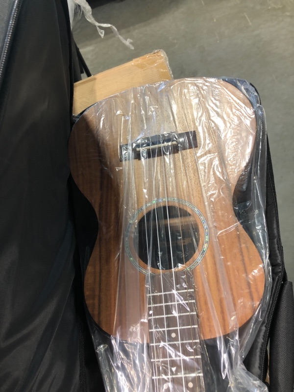 Photo 5 of Caramel CB207 Acacia Baritone Acoustic Electric Ukulele with Truss Rod with Additional Strings, Padded Gig Bag, Strap and EQ cable Laminated