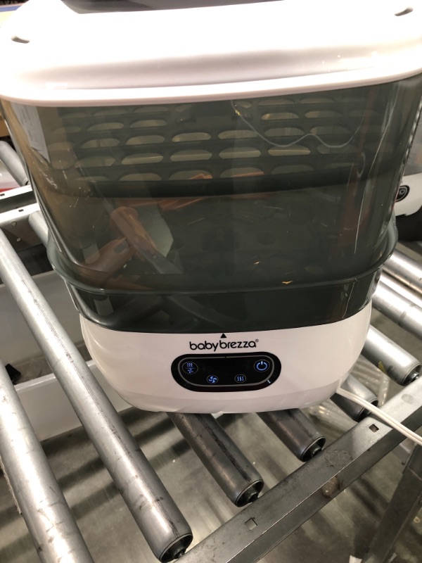 Photo 1 of Baby Brezza Bottle Sterilizer and Dryer Advanced – HEPA Filter And Steam Sterilization – Dries 33 Percent Faster Then Original - Universal Fit up to 8 Baby Bottles And 2 Sets of Pump Parts (Any Brand) Sterilizer-Dryer Advanced