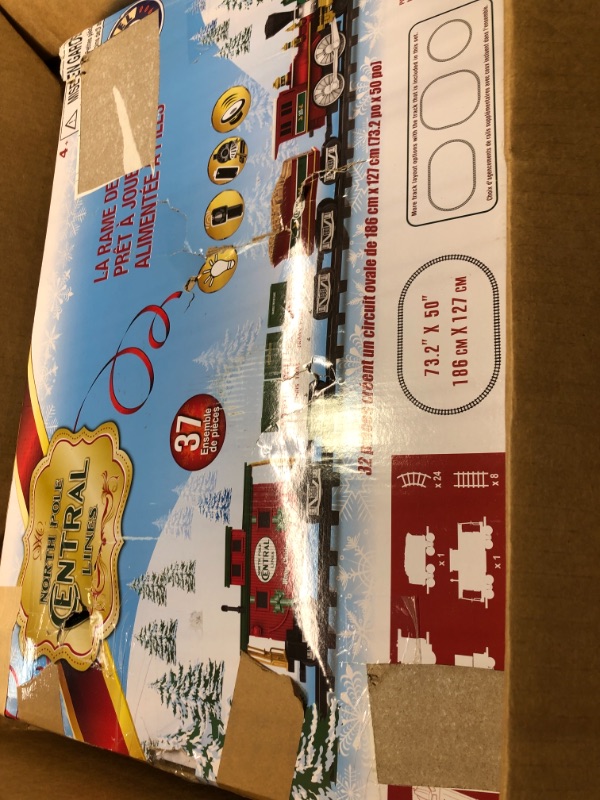 Photo 1 of Lionel North Pole Central Battery-Powered Train Set with Remote + Inner Loop Track Expansion Pack Complete Set + Expansion Track (Inner Loop)