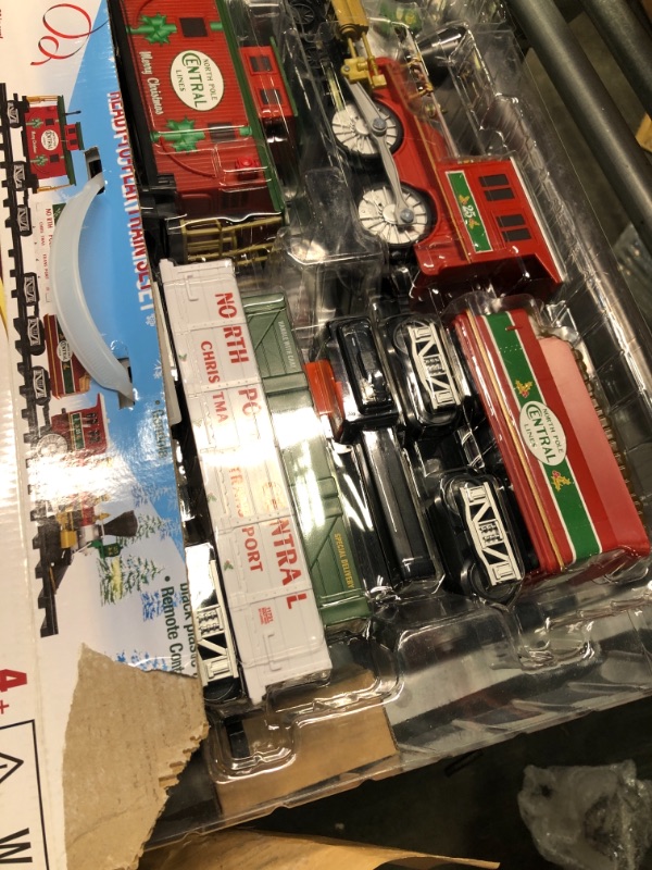 Photo 1 of Lionel North Pole Central Battery-Powered Train Set with Remote + Inner Loop Track Expansion Pack Complete Set + Expansion Track (Inner Loop)
