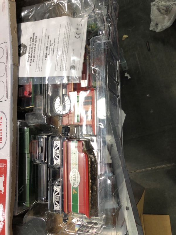 Photo 1 of Lionel North Pole Central Battery-Powered Train Set with Remote + Inner Loop Track Expansion Pack Complete Set + Expansion Track (Inner Loop)