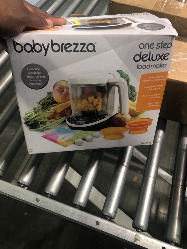 Photo 2 of Baby Brezza One Step Baby Food Maker Deluxe – Cooker and Blender in One to Steam and Puree Baby Food for Pouches - Make Organic Food for Infants and Toddlers - Set Includes 3 Pouches and 3 Funnels