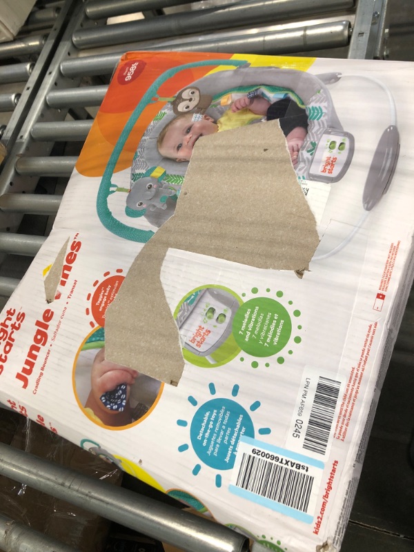 Photo 1 of Bright Starts Jungle Vines Comfy Baby Bouncer and Vibrating Infant Seat with Taggies & Elephant and Sloth Plush Baby Toys