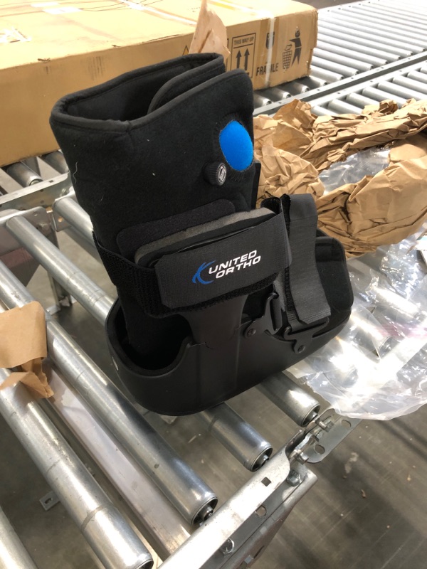 Photo 1 of United Ortho Short Air Cam Walker Fracture Boot, Medium, Black