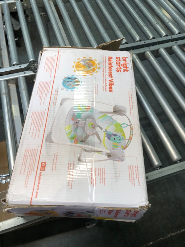 Photo 1 of Bright Starts Rainforest Vibes Portable Compact Baby Swing with TrueSpeed, Toy Bar included, Newborn and up