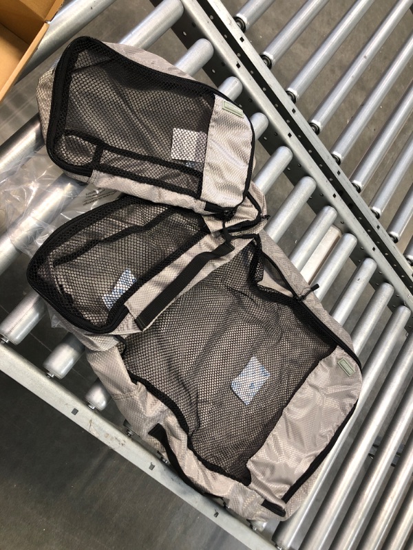 Photo 1 of Amazon Basics 4 Piece Packing Travel Organizer Cubes Set, Small, Medium, Large, and Slim, Gray Gray Small, Medium, Large, and Slim