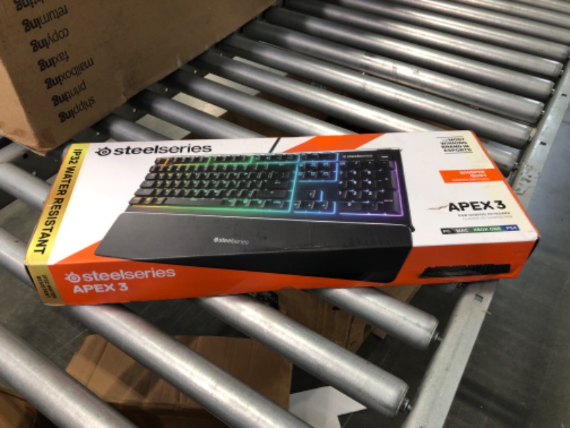 Photo 2 of SteelSeries Apex 3 RGB Gaming Keyboard – 10-Zone RGB Illumination – IP32 Water Resistant – Premium Magnetic Wrist Rest (Whisper Quiet Gaming Switch)