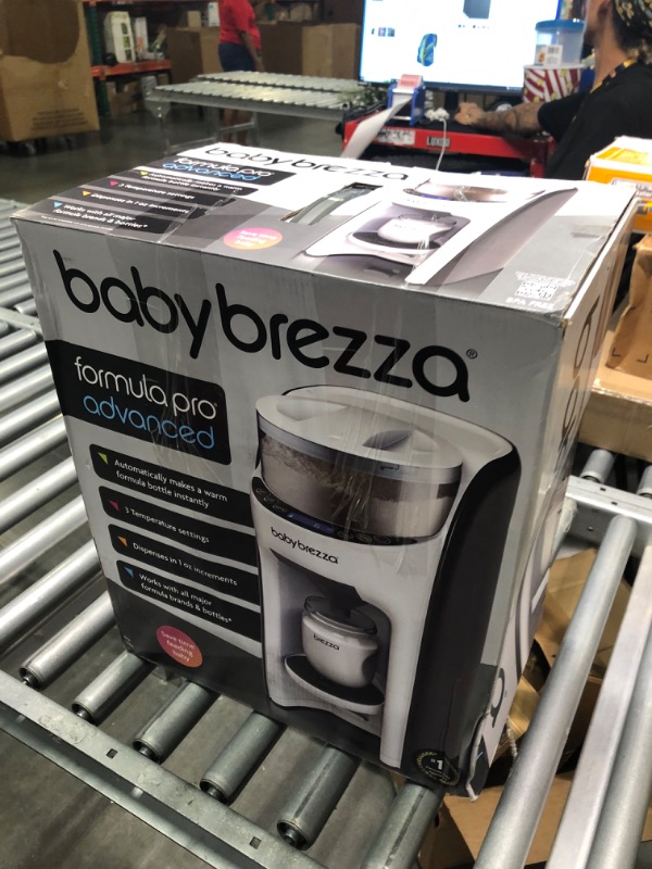 Photo 2 of New and Improved Baby Brezza Formula Pro Advanced Formula Dispenser Machine - Automatically Mix a Warm Formula Bottle Instantly - Easily Make Bottle with Automatic Powder Blending