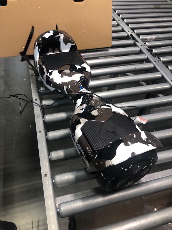 Photo 1 of Hover-1 Helix Electric Hoverboard | 7MPH Top Speed, 4 Mile Range, 6HR Full-Charge, Built-in Bluetooth Speaker, Rider Modes: Beginner to Expert Hoverboard Camo