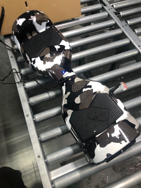 Photo 1 of Hover-1 Helix Electric Hoverboard | 7MPH Top Speed, 4 Mile Range, 6HR Full-Charge, Built-in Bluetooth Speaker, Rider Modes: Beginner to Expert Hoverboard Camo