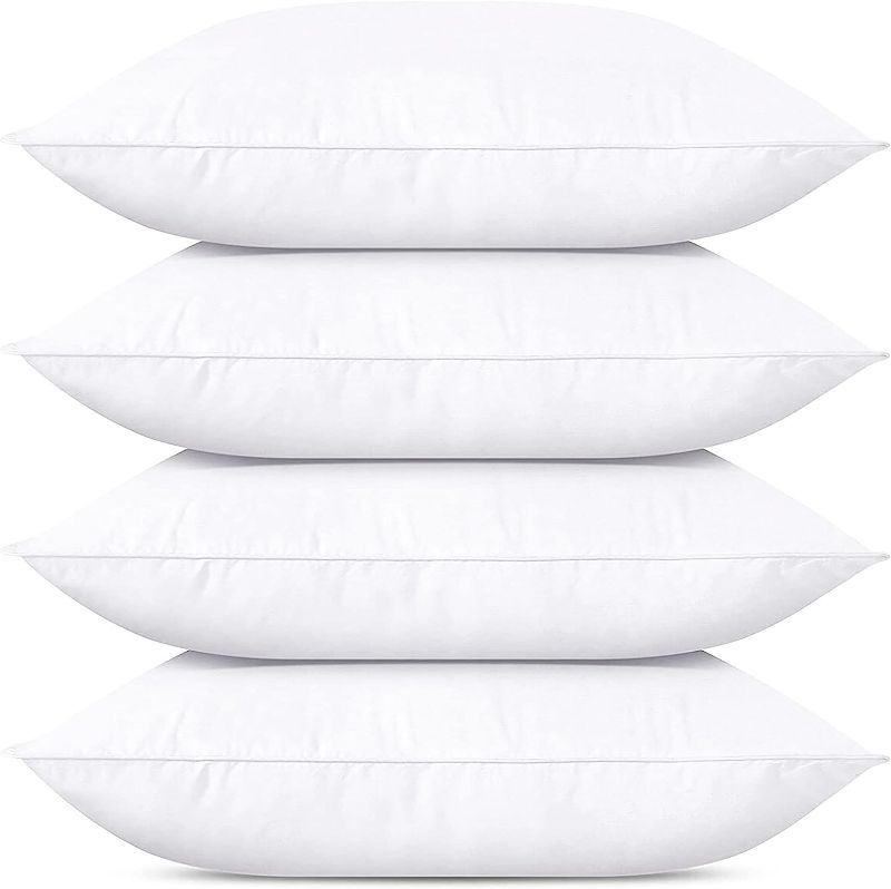 Photo 1 of 4pk of small pillows half size 