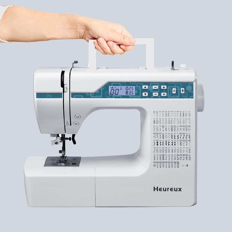 Photo 1 of Heureux Sewing and Quilting Machine Computerized, 200 Built-in Stitches, LCD Display, Z6 Automatic Needle Threader, Twin Needle